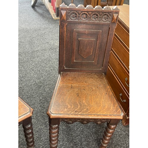 300 - Pair of antique carved hall chairs