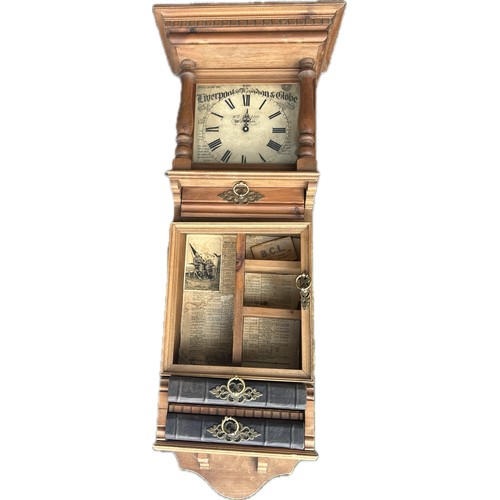 69 - Pine clock display, approximate measurements: Height 39 inches,  Width 16 inches Depth 9.5 inches, u... 