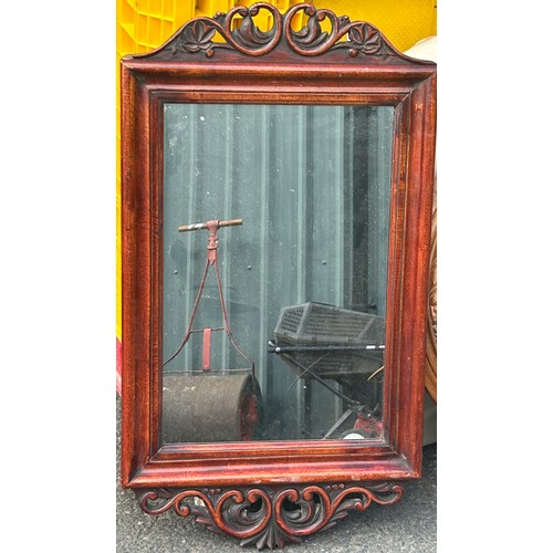 198 - 2 wooden wall hanging mirrors, largest measures approximately 35 x 25 inches