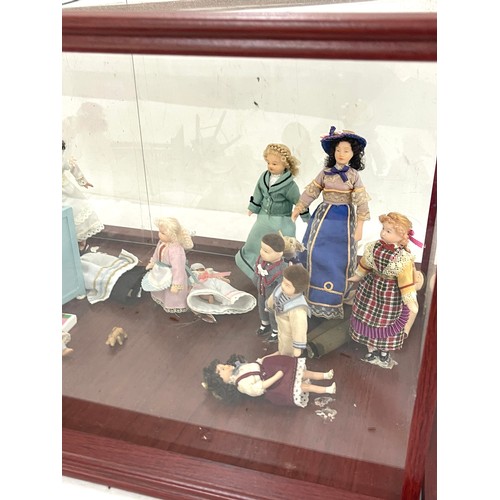 238 - Display case of vintage pot dolls house dolls, furniture and accessories