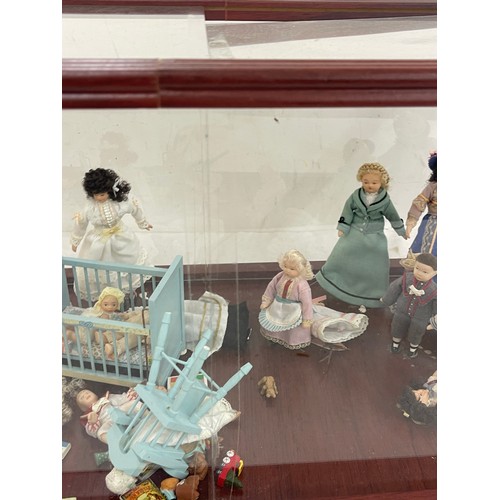 238 - Display case of vintage pot dolls house dolls, furniture and accessories