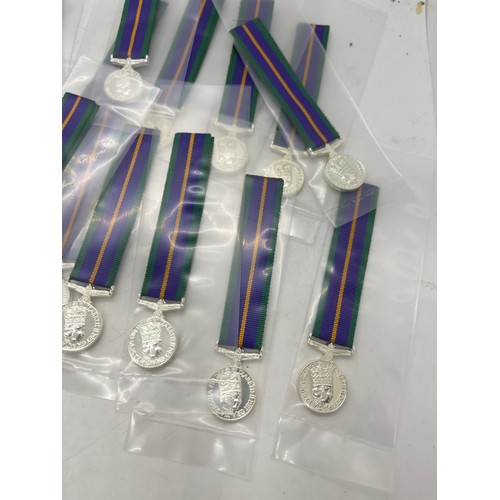 496 - Dealers lot of 25 miniature Campaign Service Medals manufactured by Toye, Kenning and Spencer