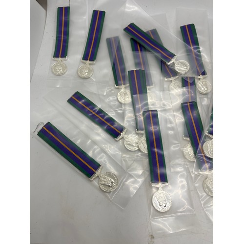 496 - Dealers lot of 25 miniature Campaign Service Medals manufactured by Toye, Kenning and Spencer