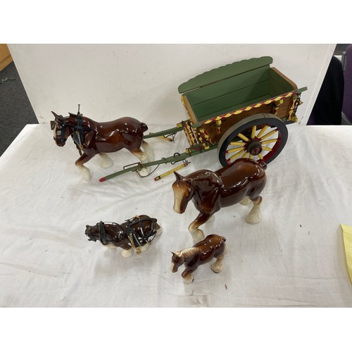 83 - Horse and trailer figure and a selection of pottery horses