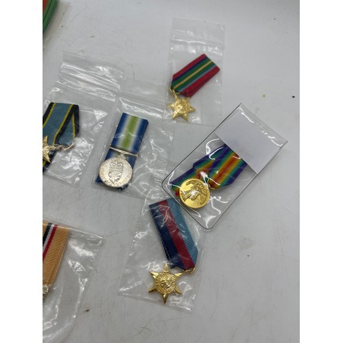 503 - Selection of 13 British war miniature medals from WWI, WWII, Falklands and Gulf wars