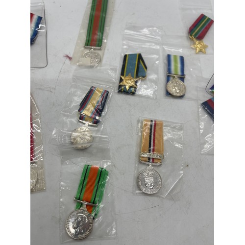 503 - Selection of 13 British war miniature medals from WWI, WWII, Falklands and Gulf wars