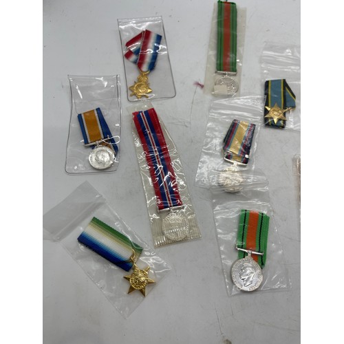 503 - Selection of 13 British war miniature medals from WWI, WWII, Falklands and Gulf wars