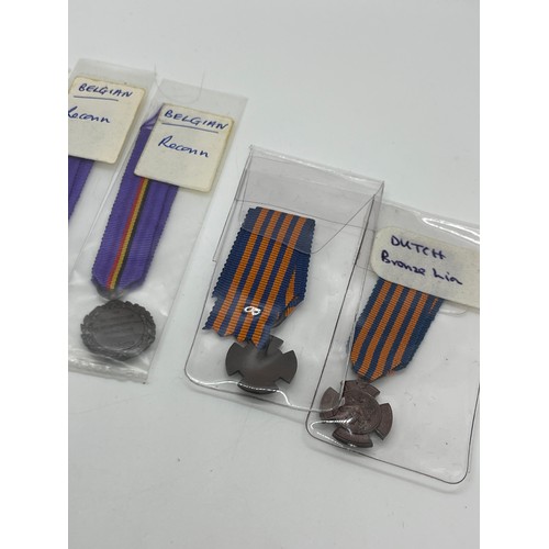 499 - Selection of 8 Belgian and Dutch Minitaure medals.  2 each of Belgian Cross des Evades, Reconnaissan... 