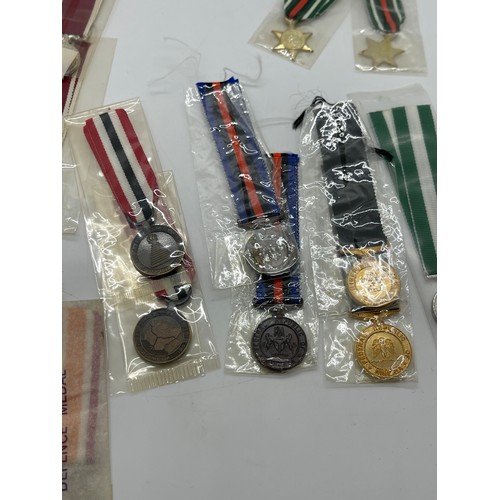 506 - Dealers lot of 12 Nigerian and 10 Malawi Miniature medals - 2 of each type of medal