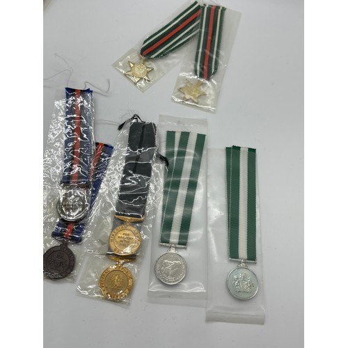 506 - Dealers lot of 12 Nigerian and 10 Malawi Miniature medals - 2 of each type of medal