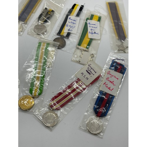 504 - Selection of 6 Brunei and 8 Guyana Miniature medals