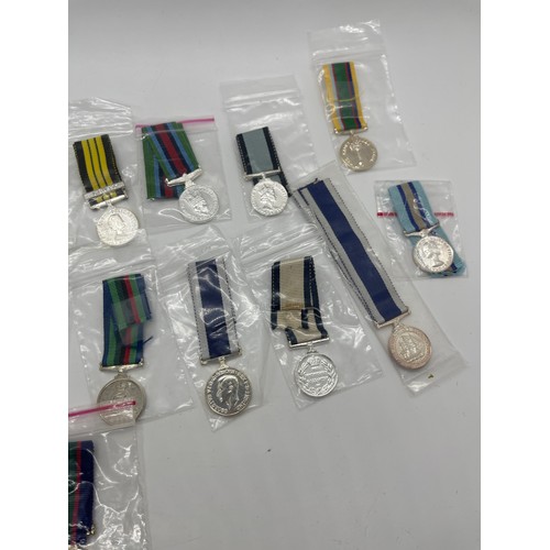 498 - Selection of 16 different British Miniature medals including Navy Long Service, Royal Naval reserve,... 