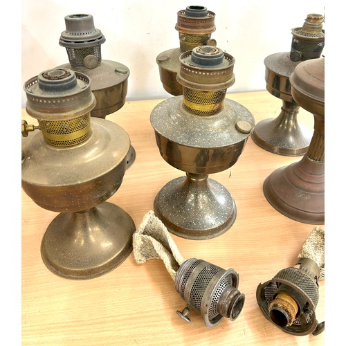 91 - Selection of 8 oil lamps (6 aladdin style) with 2 spare burners, no funnels or shades