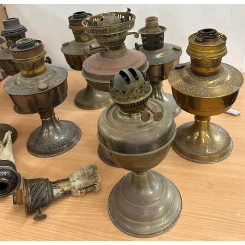 91 - Selection of 8 oil lamps (6 aladdin style) with 2 spare burners, no funnels or shades