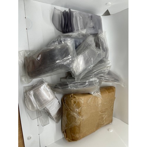 57 - Box containing over 1,000 polythene coin and medal envelopes