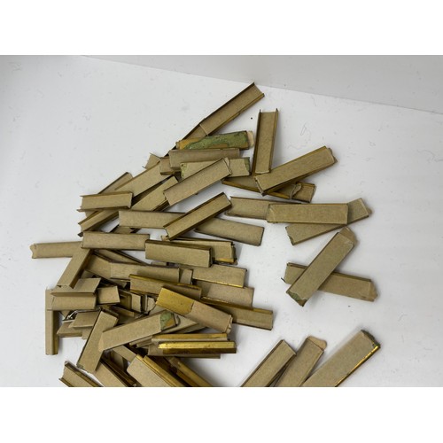 484 - Dealers lot of 50 single full size medal mounting bars plus approx. 100 medal ribbon mounting bars