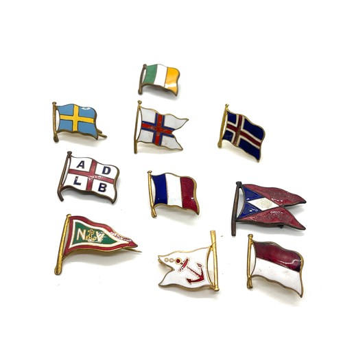 490 - Selection of 10 different vintage shipping line lapel badge flags