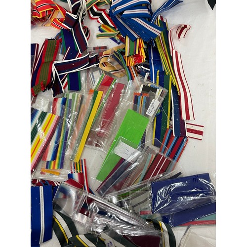 515 - Dealers lot of cut lengths of predominantly British Full Size Medal Ribbon plus some miniature ribbo... 