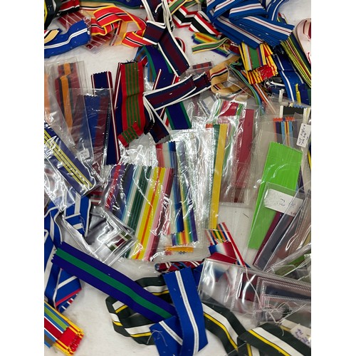 515 - Dealers lot of cut lengths of predominantly British Full Size Medal Ribbon plus some miniature ribbo... 