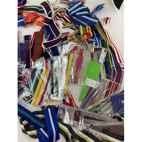 515 - Dealers lot of cut lengths of predominantly British Full Size Medal Ribbon plus some miniature ribbo... 