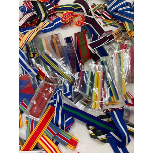 515 - Dealers lot of cut lengths of predominantly British Full Size Medal Ribbon plus some miniature ribbo... 