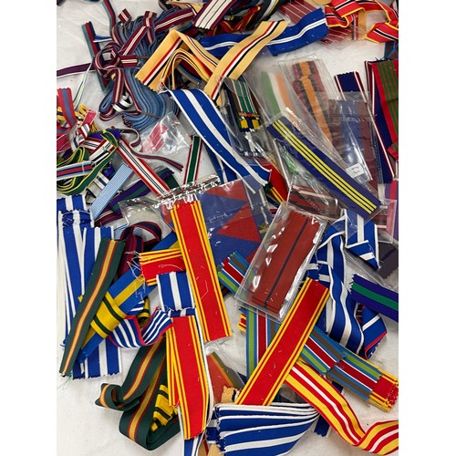 515 - Dealers lot of cut lengths of predominantly British Full Size Medal Ribbon plus some miniature ribbo... 