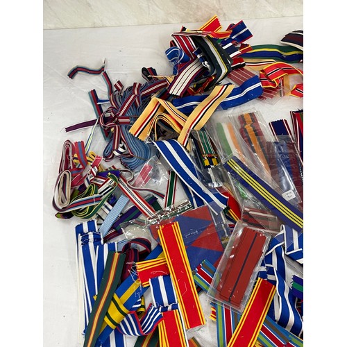 515 - Dealers lot of cut lengths of predominantly British Full Size Medal Ribbon plus some miniature ribbo... 