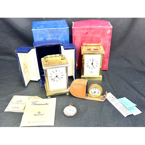 476 - Selection of clocks, to include to brass carriage clocks, silver pocket watch, all untested