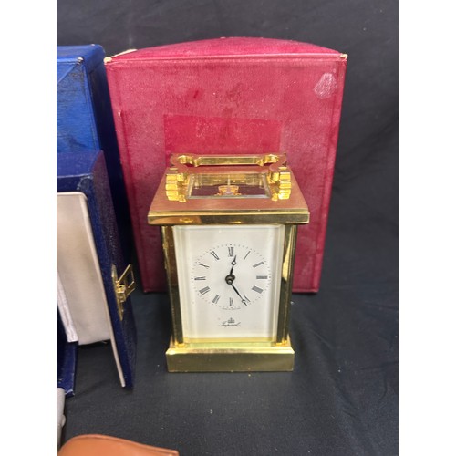 476 - Selection of clocks, to include to brass carriage clocks, silver pocket watch, all untested