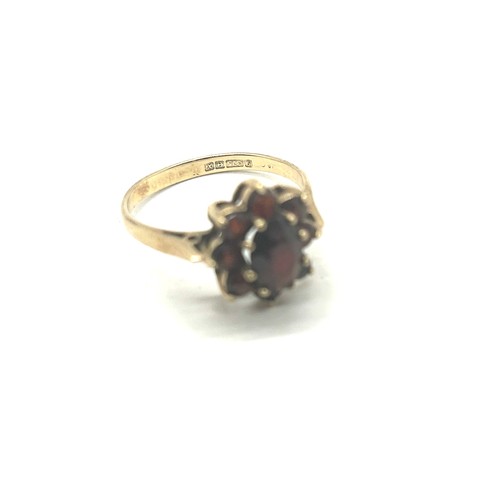 415 - 9ct Gold garnet set dress ring weight 2.4 grams m/n