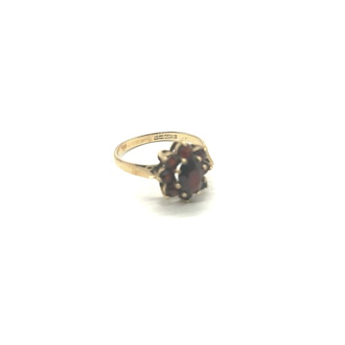 415 - 9ct Gold garnet set dress ring weight 2.4 grams m/n