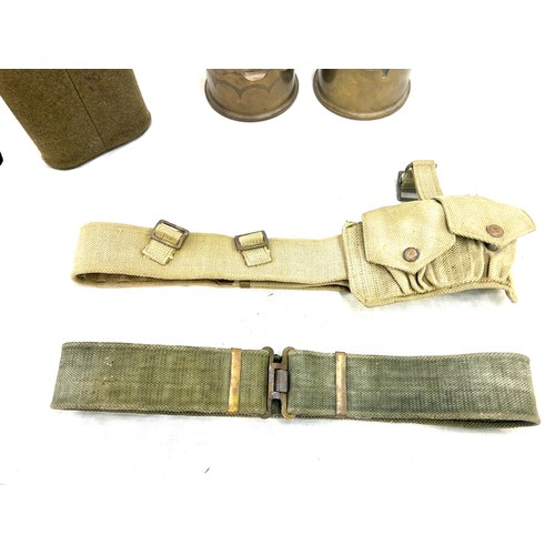 257 - 2 pieces of trench art, 2 webbing belts (one wih ammunition pouch), post war water bottle