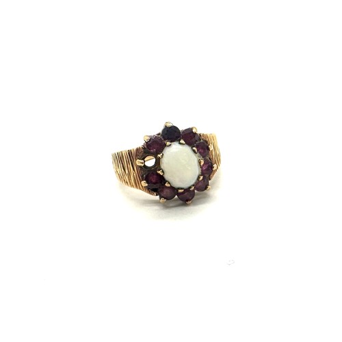 401 - 9ct gold Opal and garnet dress ring, missing one garnet, total weight 5.2 grams