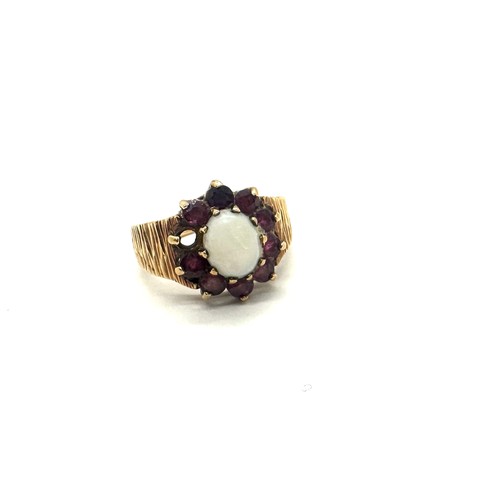 401 - 9ct gold Opal and garnet dress ring, missing one garnet, total weight 5.2 grams