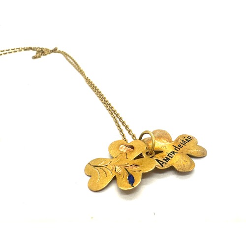 414 - 18ct Gold chain and a 20ct gold Clover pendant total weight 4 grams