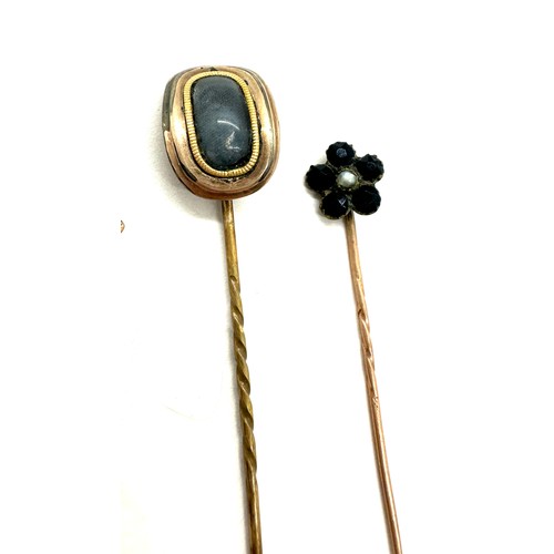 397 - Three vintage 9ct hold hat pins