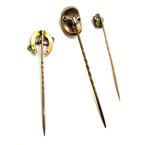 397 - Three vintage 9ct hold hat pins