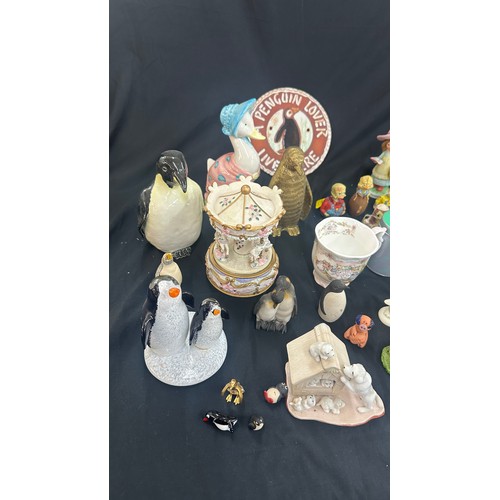 259 - Large selection of assorted ornaments includes Owls, Penguin, plaque etc