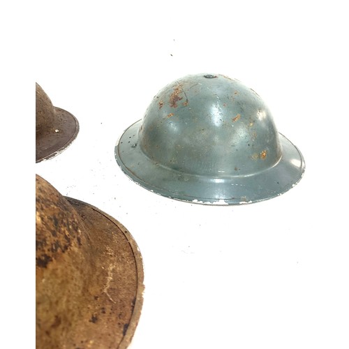 268 - 3 British military helmets to include a FAP field aid brodie helmet, 2 others