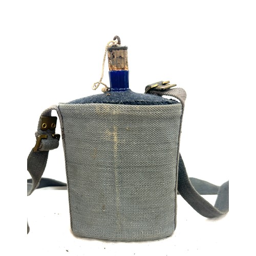 254 - 2, WW2 military water bottle carrier, one has a carry strap