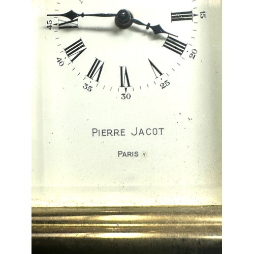 444 - Pierre jacot Paris carriage clock measures approx height 8cm by 5.7cm wide working order with key