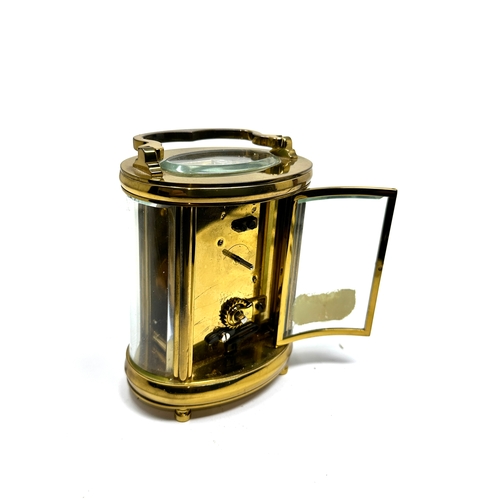 445 - Garrard & co Ltd brass carriage clock the clock is in working order measures approx 11cm high not in... 