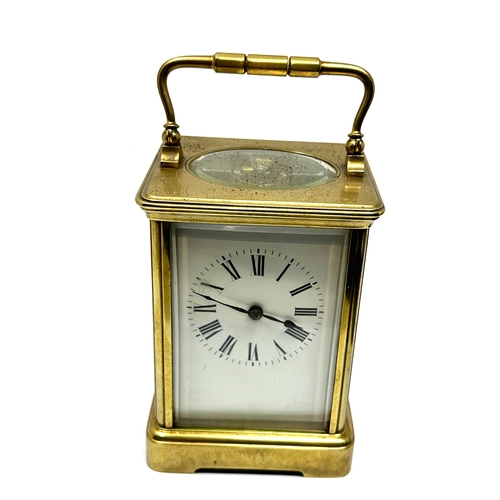 448 - Large brass striking carriage clock measures approx 13.2cm hight 8.3cm wide the clock is not ticking