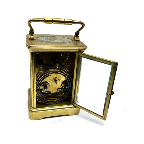 448 - Large brass striking carriage clock measures approx 13.2cm hight 8.3cm wide the clock is not ticking