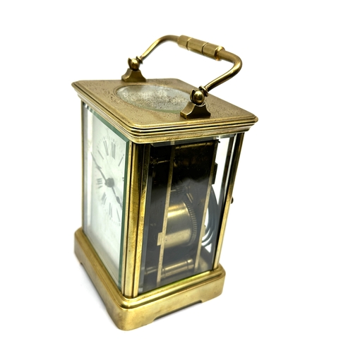 448 - Large brass striking carriage clock measures approx 13.2cm hight 8.3cm wide the clock is not ticking