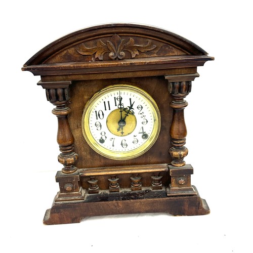 10 - Oak brass face, 2 keyhole bracket clock, untested approximate height 14.5 inches, with pendulum no k... 