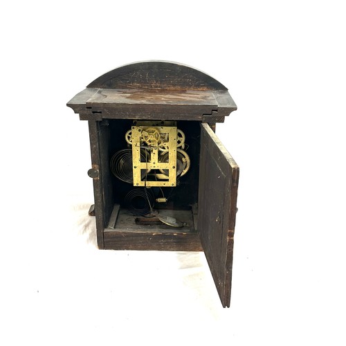 10 - Oak brass face, 2 keyhole bracket clock, untested approximate height 14.5 inches, with pendulum no k... 