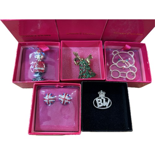 524 - Selection of 5 boxed Butler and Wilson pieces to include brooches/badges/ earrings