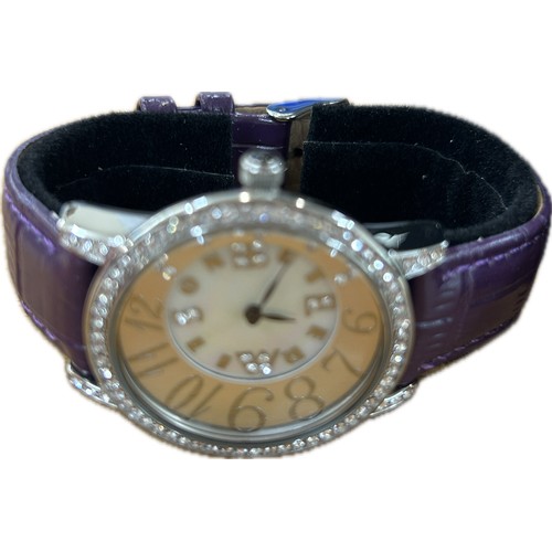 544 - Ladies stone set Butler and Wilson leather strap watch