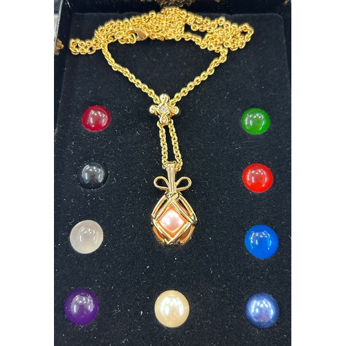 541 - Boxed with COA Joan Rivers Interchangeable egg pendant wardrobe necklace